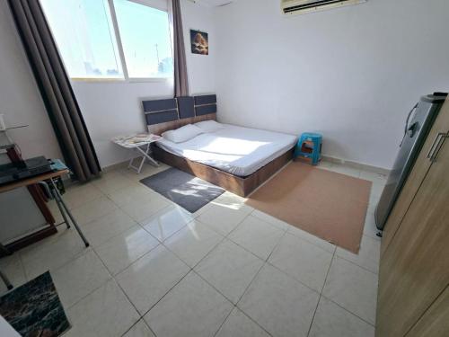 Llit o llits en una habitació de Furnished studio
