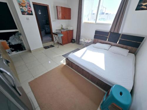 Llit o llits en una habitació de Furnished studio