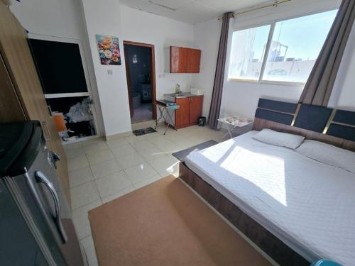 Televisor o centre d'entreteniment de Furnished studio
