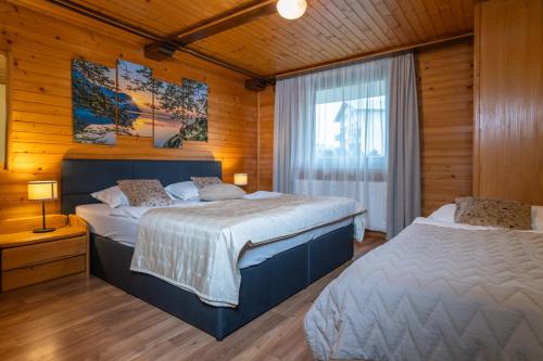 Vuode tai vuoteita majoituspaikassa Apartment Dijak