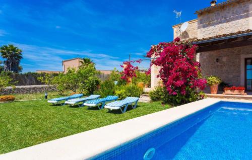 a villa with a swimming pool and a yard at Etv4268, Casa Tolo in Son Servera