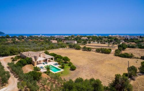 an aerial view of a house with a large yard at Clovetes in Son Servera
