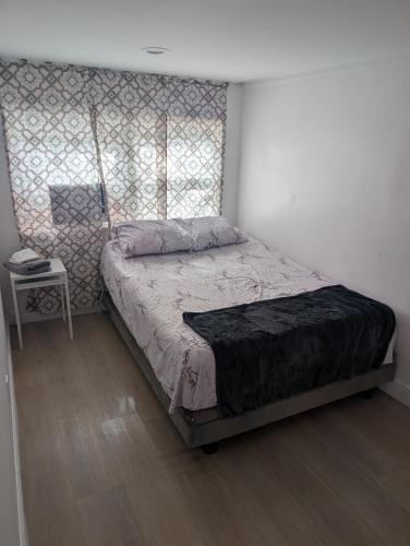 a bedroom with a bed in a room at St Pete Studio Rooms in St. Petersburg