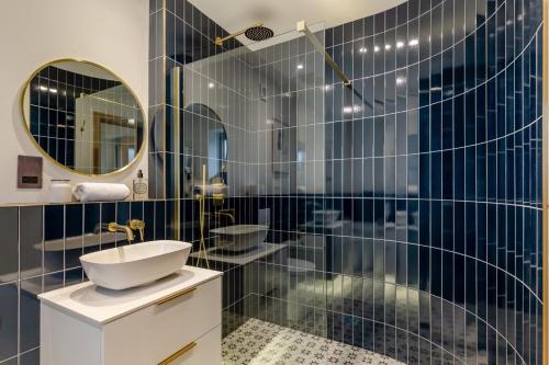 a bathroom with a sink and a mirror at 2 Bed in Melplash oc-r30043 in Netherbury