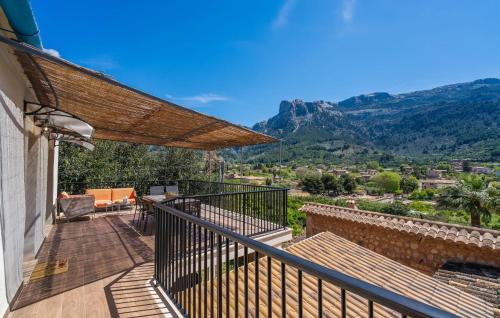 a balcony with a view of a mountain at Arbona Soller in Sóller