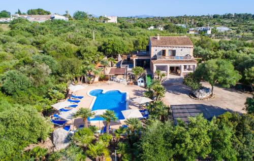 an aerial view of a villa with a swimming pool at Finca Sa Pedrera in Can Picafort