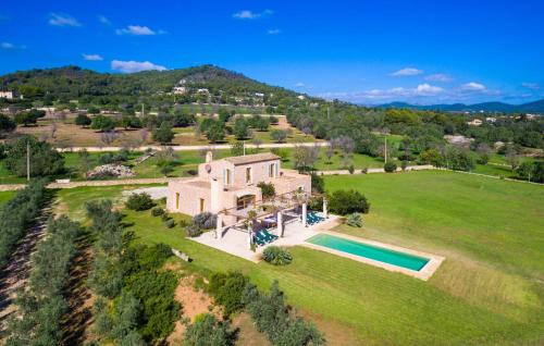an aerial view of a house with a swimming pool at Can Carrio in Son Servera