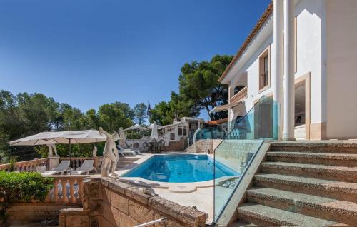 a villa with a swimming pool and stairs at Ocean View in Palma de Mallorca