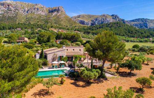 an estate in the mountains with a swimming pool at Villa Maria De Betlem in Colonia de Sant Pere