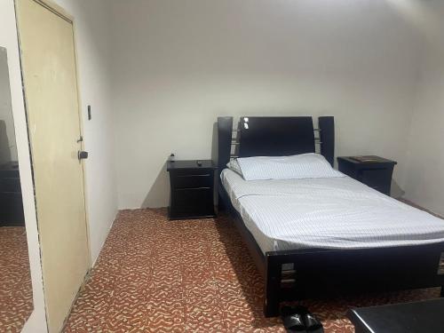 Postel nebo postele na pokoji v ubytování Apartamento Alfredo