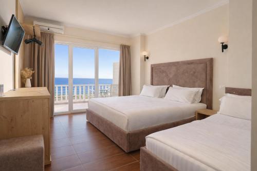 Llit o llits en una habitació de Hotel Bleart