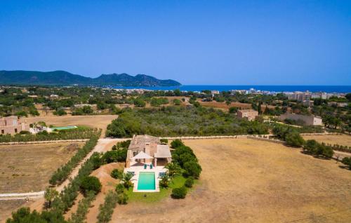 an aerial view of a house on a field at Clovetes in Son Servera