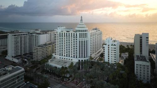 an aerial view of a large building near the ocean at Loews Miami Beach Hotel in Miami Beach