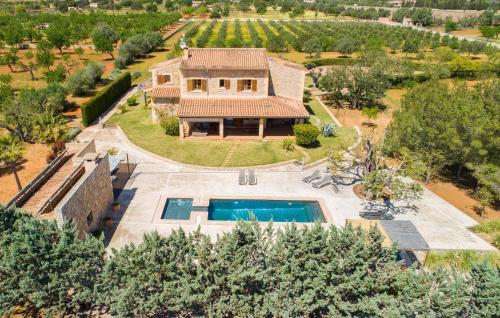 an aerial view of a house with a swimming pool at Es Triquet in Binissalem