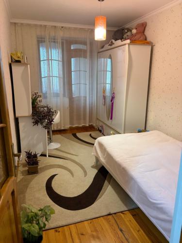 Lankaran house tesisinde bir odada yatak veya yataklar