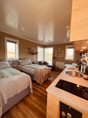 Llit o llits en una habitació de Rein 2 Cabin