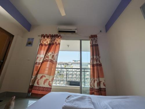 En eller flere senge i et værelse på Cox Flat Booking