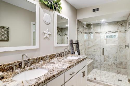 a bathroom with two sinks and a shower at Anchorage 7442 in Hilton Head Island