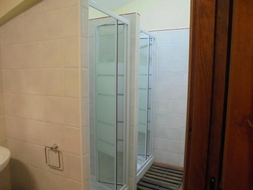 a shower with a glass door in a bathroom at Caserío Areitz Soroa in Arce