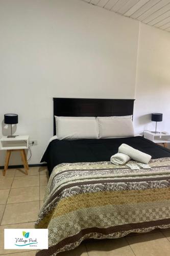 Llit o llits en una habitació de VILLAGE PARK