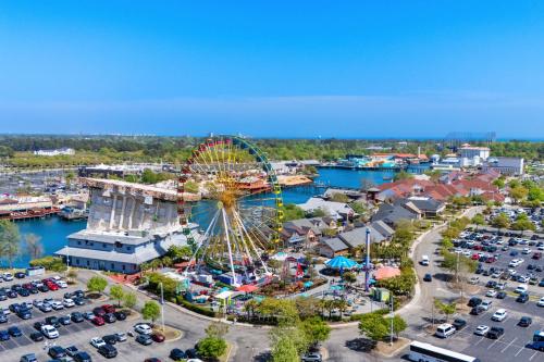 an aerial view of an amusement park with a ferris wheel at Chelsea House unit 201 in Myrtle Beach