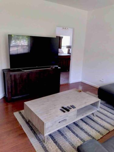 a living room with a coffee table and a couch at Amazing Ranch Home in Temecula wine country in Temecula