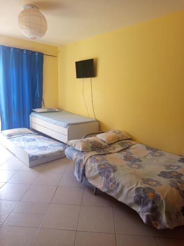 Llit o llits en una habitació de Appartamento Gianni