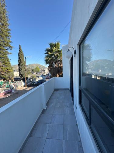 a balcony with a view of a street at Depa en La Cienega in Tijuana