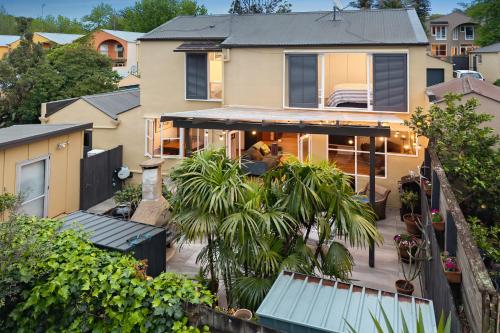 an aerial view of a house with trees at Napier St in Auckland