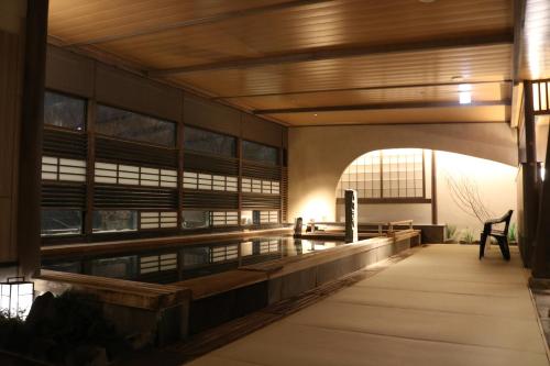 a view of the lobby of a building at Jozankei Onsen Yurakusoan in Jozankei