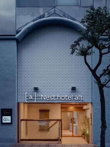 a building with a sign that reads last nest hotel art at Nesthotel alt Kawasaki Station in Kawasaki
