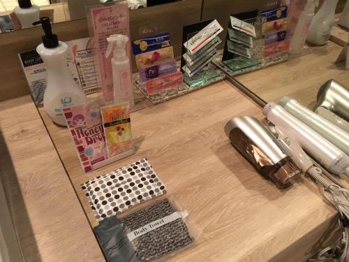 a counter top with a hair dryer and a blow dryer at Hotel Jardin de Fleurs (Adult Only) in Kyoto
