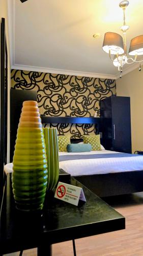TV a/nebo společenská místnost v ubytování Belrom Hotel