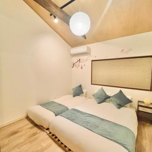 Up to 8 people , 65square , 10minutes by train to Namba , Japanese garden in the courtyard , Family-friendly , Free parking