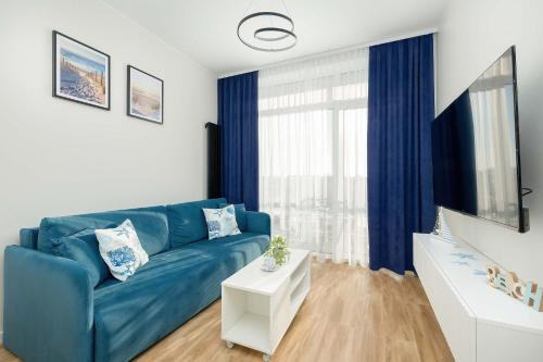 Blue and Beige Apartment in Sianożęty with Seasonal Pool, Parking and Balcony by Noclegi Renters