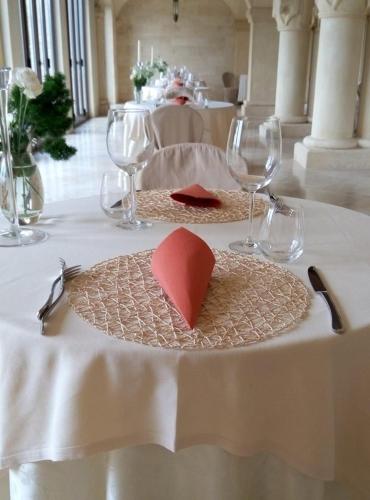 a table with a plate with a red heart on it at Agriturismo Monastero Di San Biagio in Nocera Umbra