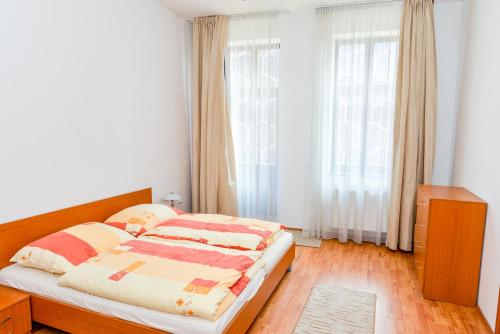 Katil atau katil-katil dalam bilik di Apartment Downtown