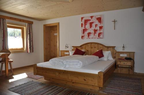 Tempat tidur dalam kamar di Gästepension Klammer