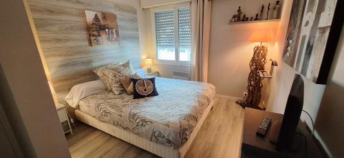 เตียงในห้องที่ CYBELE APARTMENT - HYPER CENTRE