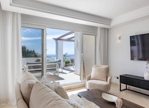 Elegant Duplex Penthouse with Sea and Mountain Views