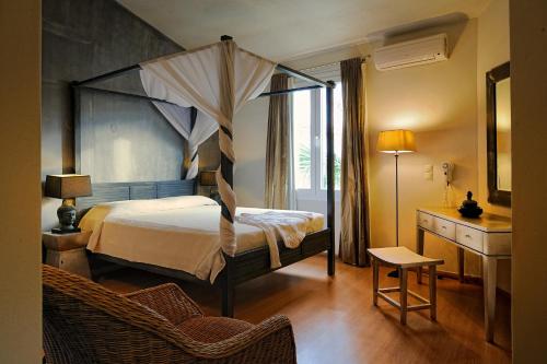 Ένα ή περισσότερα κρεβάτια σε δωμάτιο στο Paradise Island Villas