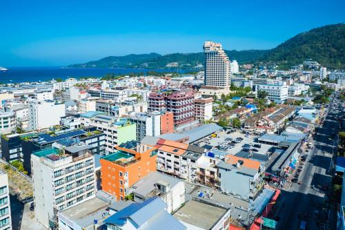 an aerial view of a city with buildings at Phuket Patong Buri Resort in Patong Beach