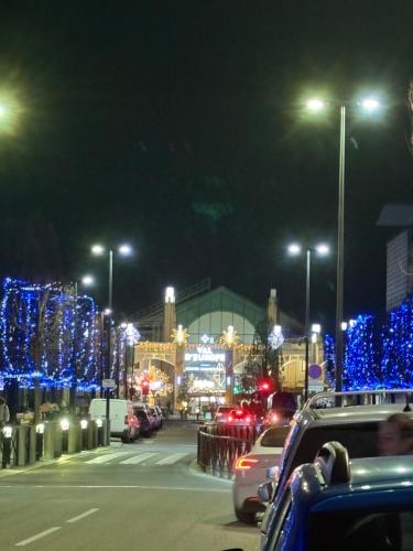 a city street at night with blue christmas lights at Disney 4 min, from 4 to 14 Guests, 4 bedrooms, free parkings, 100 m2 in Chessy