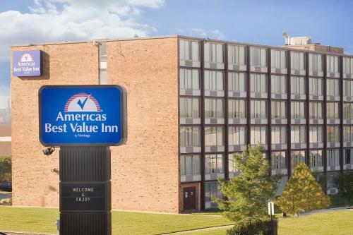 a sign in front of a building at Americas Best Value Inn - Baltimore in Baltimore