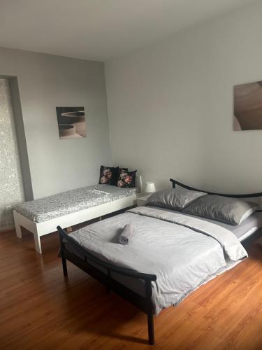 a bedroom with two beds in a room at 4 May Plaza in Bratislava