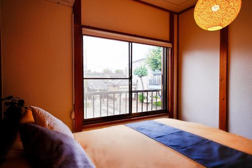 Takara Entire Japanese house with a view of the shrine