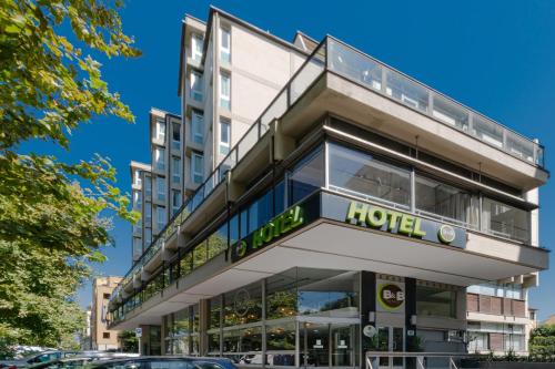 a hotel building with a sign that reads hotel at B&B Hotel Firenze City Center in Florence