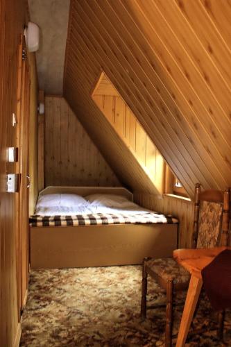 Letto o letti in una camera di Camping Pod Krokwią