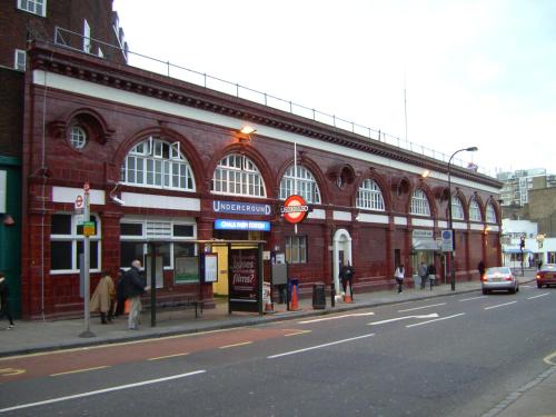 a large red brick building on a city street at Hampstead Britannia in London