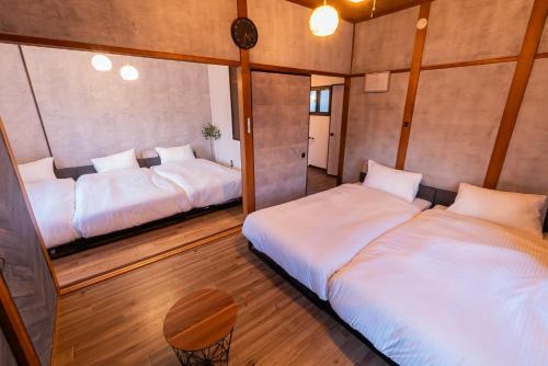 "Hidden in Ozone-Nagoya"名古屋 戸建貸切り宿 8名定員 P1台 ベッド7台寝室3部屋 駅近IGアリーナ ドーム至近